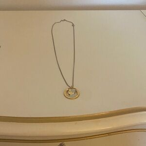 Elegant Gold and Silver Pendant Necklace
